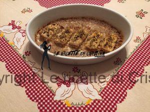 Filetti di nasello con panure di pistacchio e crema di funghi all'aglio