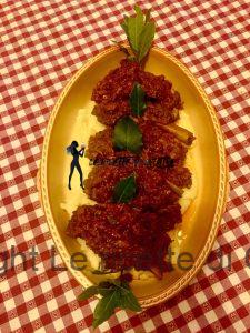 Costine di maiale in umido con purè di patate