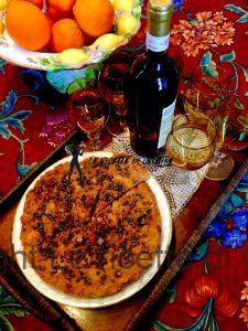 Torta di panbrioche, cioccolato e noci all'arancia