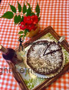 Torta di riso rosso al cioccolato, arancia e noci