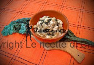 Riso e patate mantecato con burro all'aglione e pesto di cavolo nero