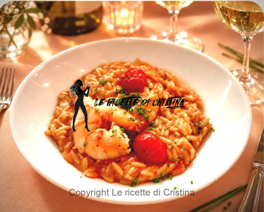 Risotto al pomodoro con gamberi ed erba cipollina